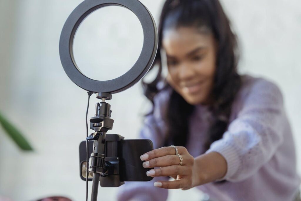 Woman setting up her phone to record